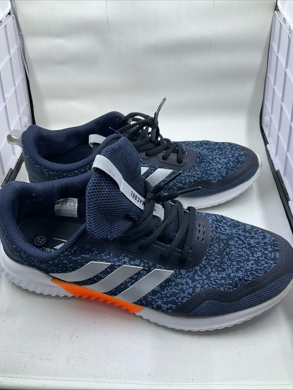 adidas Men's Navy Blue Athletic Shoes with Silver Stripes and Orange Accent